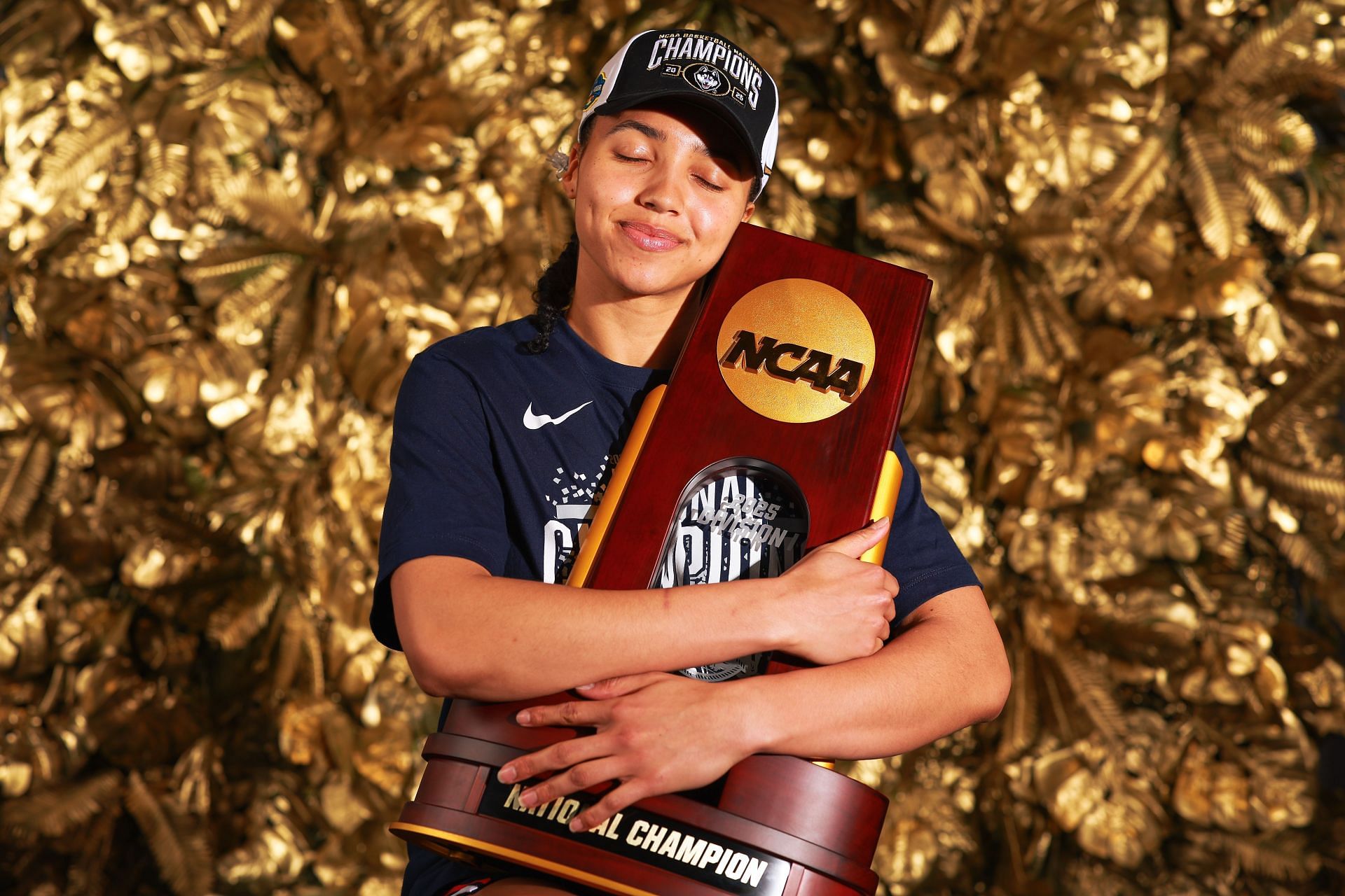 Azzi Fudd (#35) of the UConn Huskies poses for a championship portrait after defeating the South Carolina Gamecocks in the final of the 2025 NCAA Tournament at Amalie Arena in Tampa, Florida. Photo: Getty